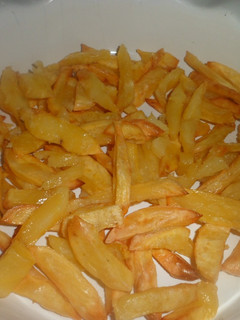 Una foto de Papas fritas al horno y entraña.