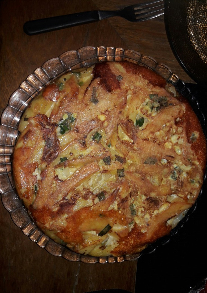 Una foto de Tortilla de papas rellena