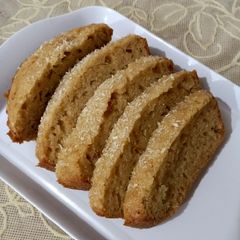 A picture of Cake with lemon peels.