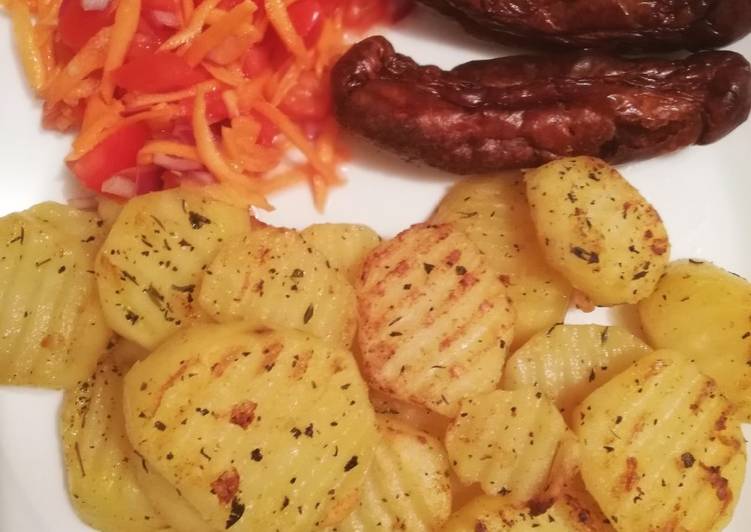 Step-by-Step Guide to Prepare Perfect Seasoned potatoes, kachumbari &amp; pork sausages