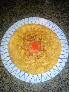 Una foto de Tortilla de calabacín y cebolla