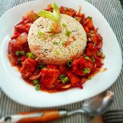 A picture of Chicken and Chilli Saucewith rice bowl...