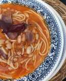 Porotos con Riendas y papas chilotas