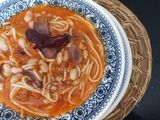 Porotos con Riendas y papas chilotas