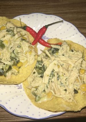 Una foto de Pollo con rajas poblabas