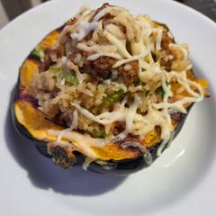 A picture of Sausage and Rice Stuffed Acorn Squash.