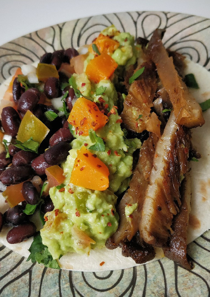 Una foto de Tacos de setas y frijoles