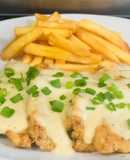 Pechugas a la sartén bañadas en salsa bechamel con queso