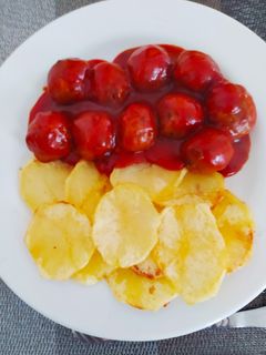 Una foto de Albóndigas de arroz con tomate (Receta vegetariana)