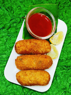 A picture of Shezwan potato nuggets.