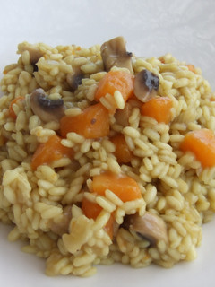 Una foto de Arroz con calabaza y champiñones