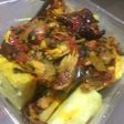 Boiled yam and palm oil pepper sauce