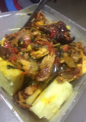 A picture of Boiled yam and palm oil pepper sauce.