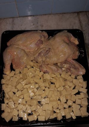 Una foto de Pollo al horno con papas