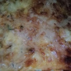 A picture of Chicken tikka pizza.
