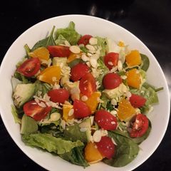 A picture of My kind of fresh nutty and fruity garden salad.