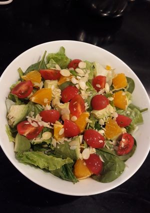 A picture of My kind of fresh nutty and fruity garden salad.