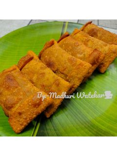 पुडाची कोंथीबीर वडी (Pudachi Kothimbir Vadi Recipe In Marathi) रेसिपी चे मुख्य फोटो