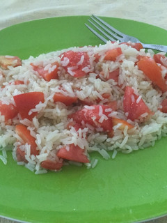 Una foto de Tomate con arroz graneado