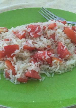Una foto de Tomate con arroz graneado