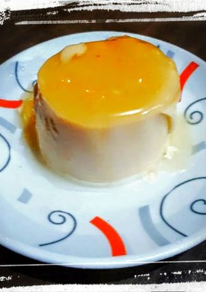 Una foto de Panacotta con Coulis de Limón