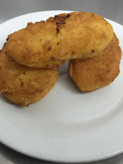 Una foto de Pastelitos de yuca y cerdo