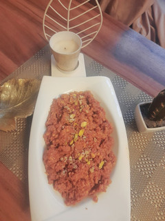 A picture of Gajar ka halwa with peels.