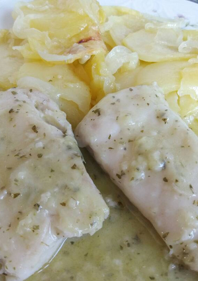 Una foto de Merluza en salsa verde