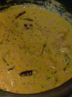 A picture of Shrimp in coconut sauce (Kerala style yellow shrimp Curry).
