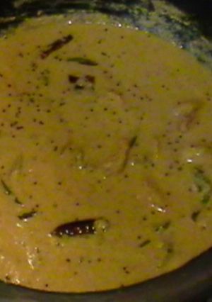 A picture of Shrimp in coconut sauce (Kerala style yellow shrimp Curry).