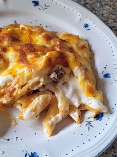 Una foto de Macarrones con bechamel