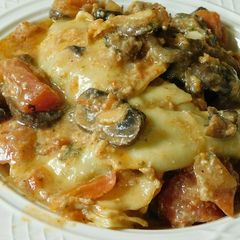 A picture of Ravioli (cheese and spinach stuffed Ravioli).