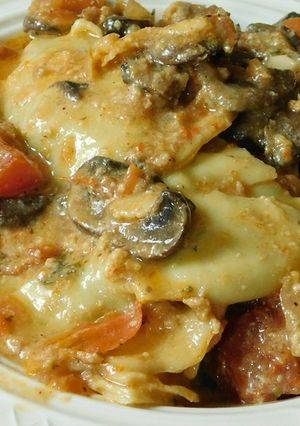 A picture of Ravioli (cheese and spinach stuffed Ravioli).