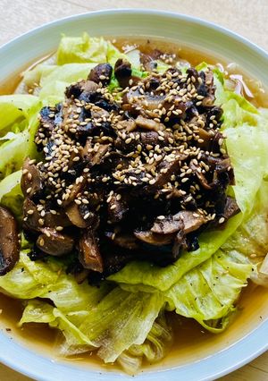 A picture of Lettuce with homemade pickled mushrooms.