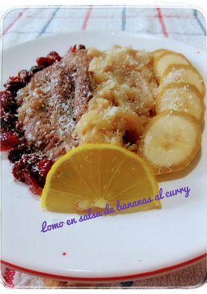 Una foto de Lomo con bananas al curry