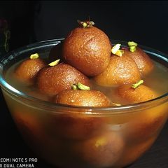 A picture of Mawa gulab jamun stuff with kesar pista.