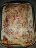 Canelones de acelga y ricota con salsa blanca y salsa de tomate
