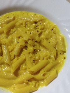 Una foto de Plumas con arroz con quinoa a la crema