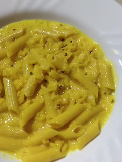 Una foto de Plumas con arroz con quinoa a la crema