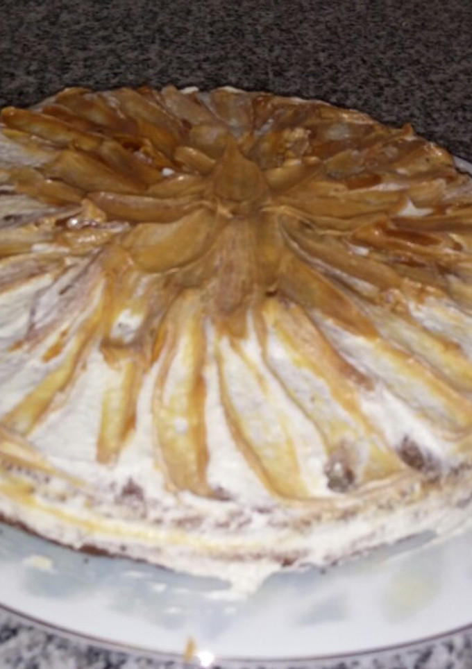 Una foto de Torta de manzana canela y dulce de leche