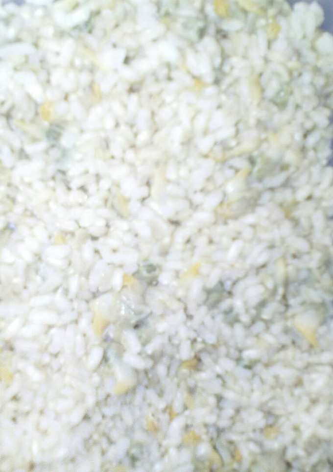 Una foto de Arroz integral con berberechos