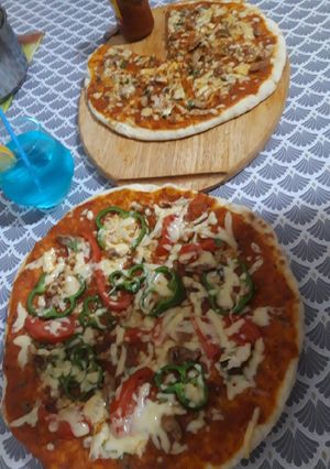 صورة لوصفة بيتزا في الطجين مثل المحلات 🍕🇩🇿