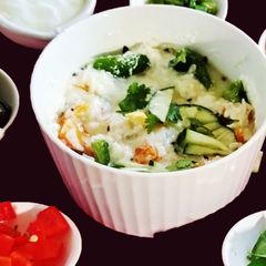A picture of DHADIYODANAM(TAMIL) Curd rice).
