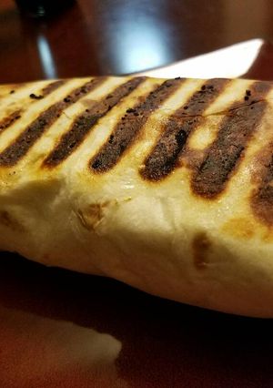 A picture of Grilled Chicken Wrap with Jicama Mango Slaw.