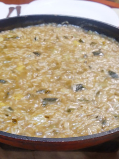 Una foto de Risotto con zuchinne (risotto de calabacín)