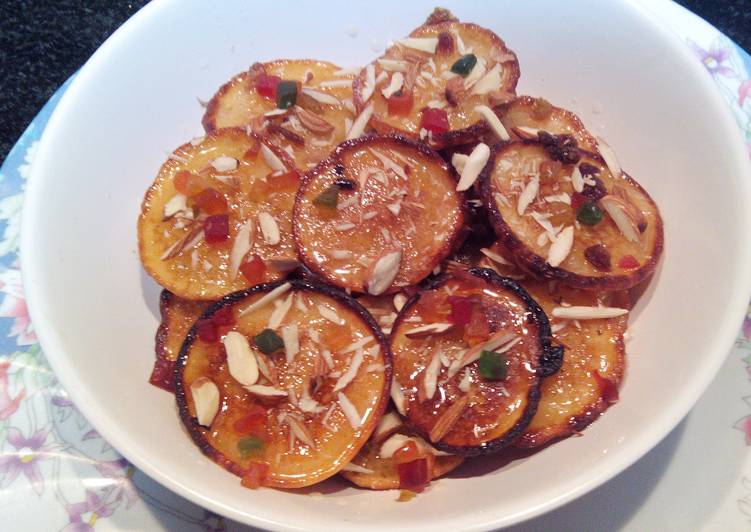 Orange Blast Malpuas with fresh halwa/rabri