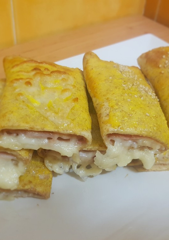 Una foto de Napolitanas de pavo y queso