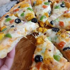 A picture of Homemade Chicken Tikka Pizza 🍕🍕🍕.
