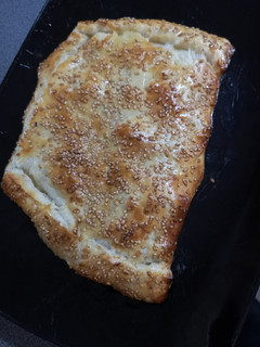 Una foto de Hojaldre de solomillo, queso brie y cebolla caramelizada