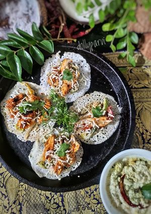 A picture of Chicken Sukka with Mini Dosa.